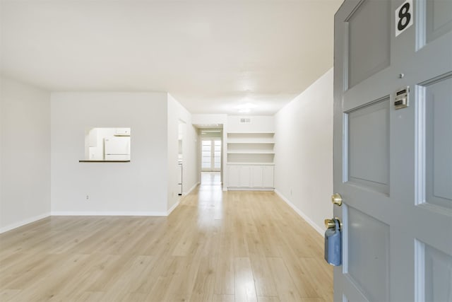 4500 Sherwood Ln Unit 8, Houston, TX 77092 - unfurnished room featuring light wood-style floors and baseboards
