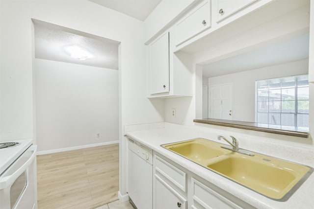 4500 Sherwood Ln Unit 8, Houston, TX 77092 - kitchen with white appliances, light countertops, and white cabinets