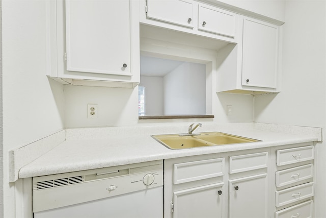 4500 Sherwood Ln Unit 8, Houston, TX 77092 - kitchen with dishwasher, light countertops, and white cabinetry