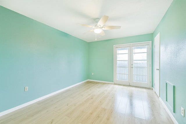 4500 Sherwood Ln Unit 8, Houston, TX 77092 - empty room with french doors, ceiling fan, and light wood-style floors