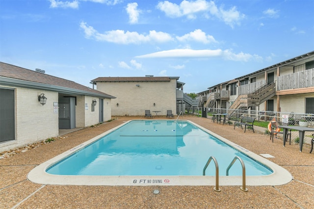 4500 Sherwood Ln Unit 8, Houston, TX 77092 - community pool featuring a residential view