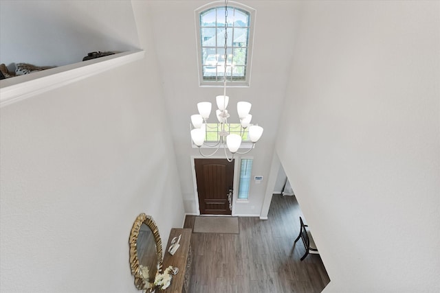 3823 Fleetwood Falls Ln, Spring, TX 77386 - foyer with a chandelier and wood finished floors