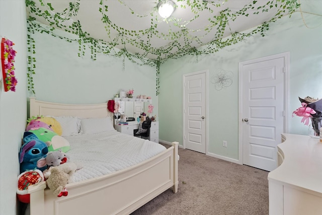 3823 Fleetwood Falls Ln, Spring, TX 77386 - bedroom featuring light carpet and baseboards