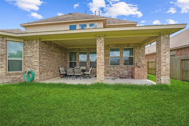 3823 Fleetwood Falls Ln, Spring, TX 77386 - rear view of property with a patio area, brick siding, and a shingled roof