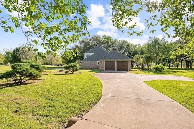 214 Caleta Cir, Richmond, TX 77406 - view of side of home with concrete driveway, a yard, brick siding, and a garage