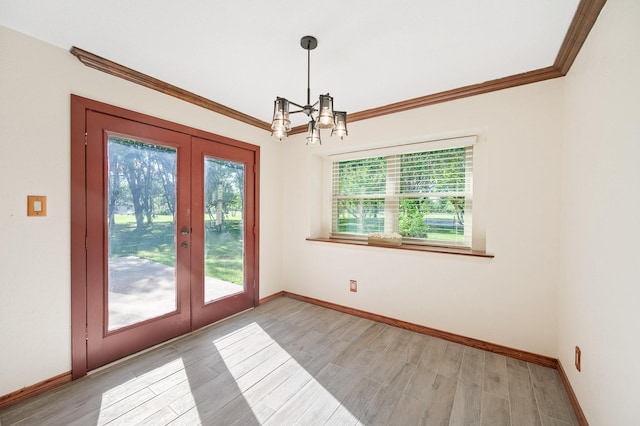 214 Caleta Cir, Richmond, TX 77406 - doorway featuring french doors, crown molding, a chandelier, and light wood finished floors