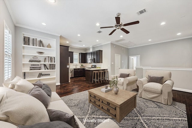 1707 Crockett St Unit A, Houston, TX 77007 - living room featuring dark wood-type flooring, crown molding, a ceiling fan, and recessed lighting
