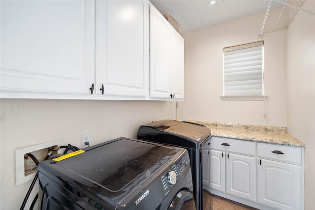 12543 Country Arbor Ln, Houston, TX 77041 - laundry area with washing machine and clothes dryer and cabinet space