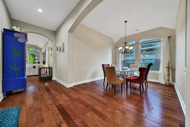 66 N Rocky Point Cir, Spring, TX 77389 - dining room featuring lofted ceiling, arched walkways, wood-type flooring, and a chandelier
