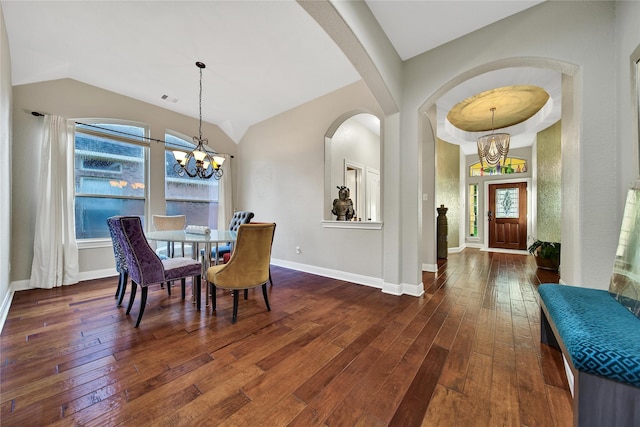 66 N Rocky Point Cir, Spring, TX 77389 - dining area featuring a chandelier, dark wood-style floors, plenty of natural light, and lofted ceiling
