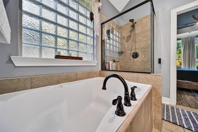 66 N Rocky Point Cir, Spring, TX 77389 - full bathroom with a bath and a shower stall