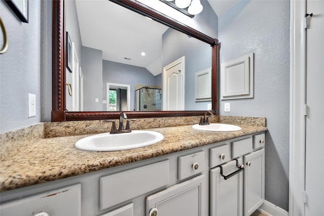 66 N Rocky Point Cir, Spring, TX 77389 - full bathroom with a shower stall and double vanity