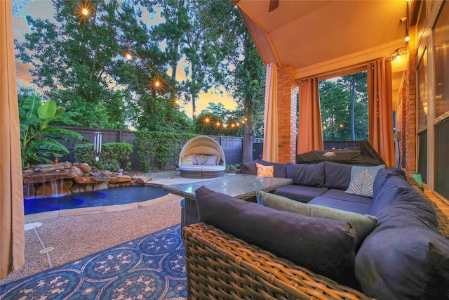 66 N Rocky Point Cir, Spring, TX 77389 - fenced backyard featuring an outdoor hangout area and a patio area