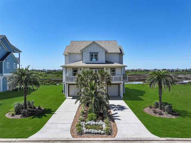3914 Curlew Dr, Galveston, TX 77554 - raised beach house with board and batten siding, an attached garage, driveway, a front lawn, and a water view