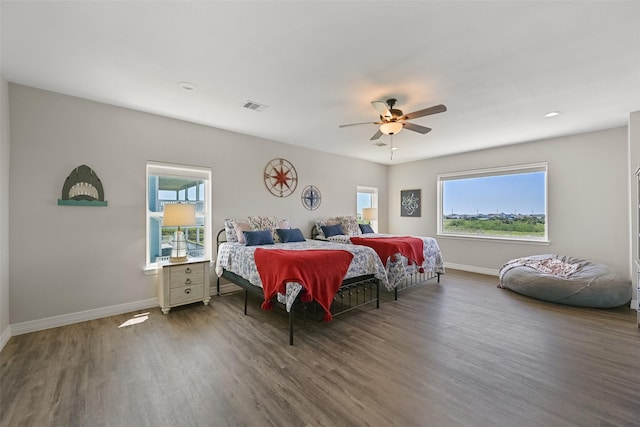 3914 Curlew Dr, Galveston, TX 77554 - bedroom with wood finished floors and a ceiling fan