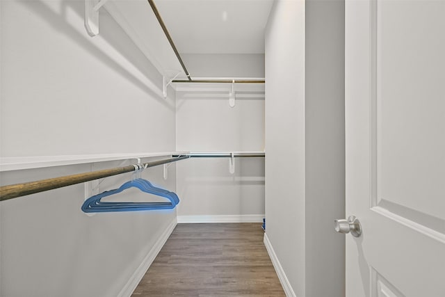 3914 Curlew Dr, Galveston, TX 77554 - spacious closet featuring wood finished floors
