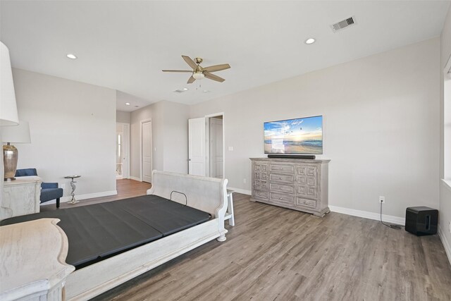 3914 Curlew Dr, Galveston, TX 77554 - bedroom featuring wood finished floors, recessed lighting, and a ceiling fan