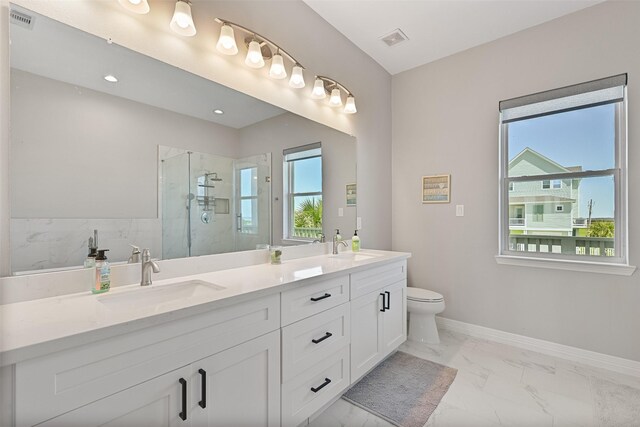 3914 Curlew Dr, Galveston, TX 77554 - full bath featuring marble finish flooring, double vanity, and a marble finish shower