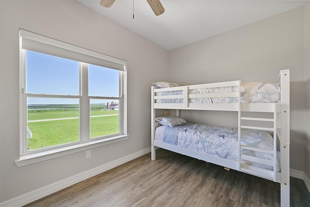 3914 Curlew Dr, Galveston, TX 77554 - bedroom featuring wood finished floors and a ceiling fan