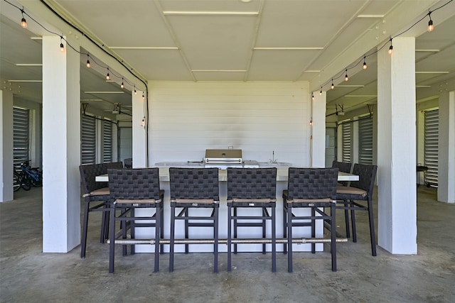 3914 Curlew Dr, Galveston, TX 77554 - view of patio / terrace featuring a grill
