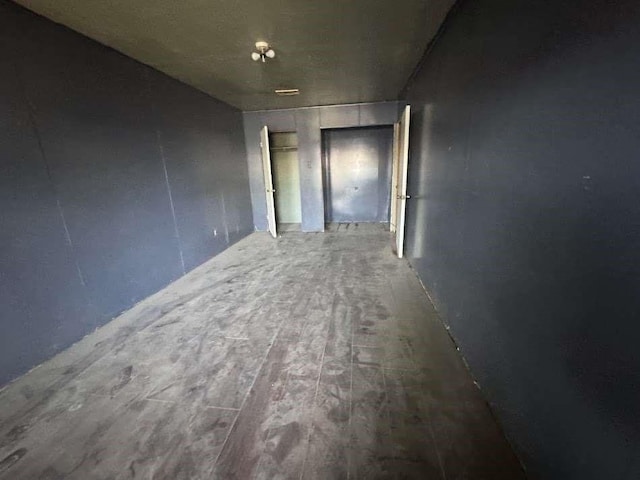 1807 E 1st St, Lubbock, TX 79403 - spare room featuring wood finished floors