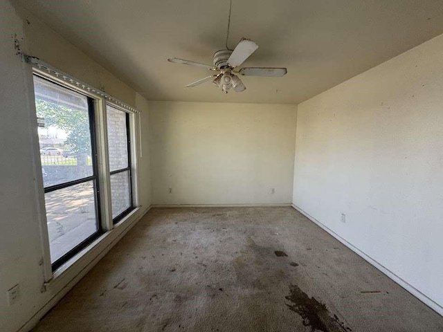 1807 E 1st St, Lubbock, TX 79403 - unfurnished room featuring light carpet and a ceiling fan