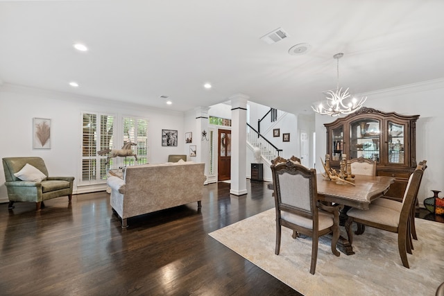 2516 Bagby St, Houston, TX 77006 - dining room featuring ornamental molding, stairs, dark wood-type flooring, a chandelier, and recessed lighting