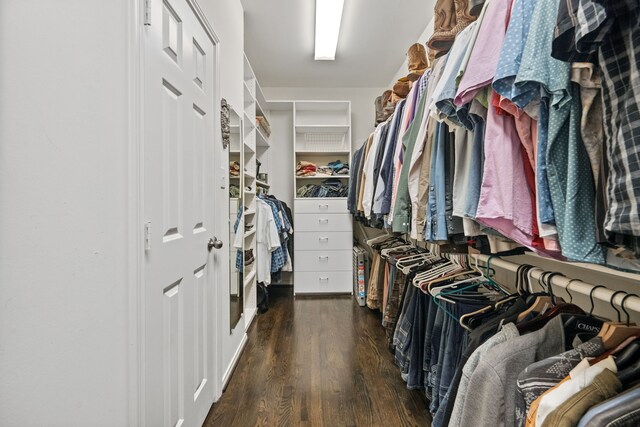 2516 Bagby St, Houston, TX 77006 - spacious closet featuring wood finished floors