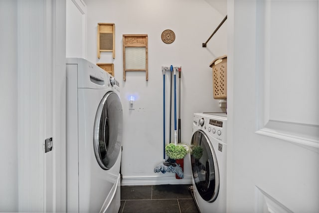 2516 Bagby St, Houston, TX 77006 - laundry area with tile patterned floors and washer and dryer