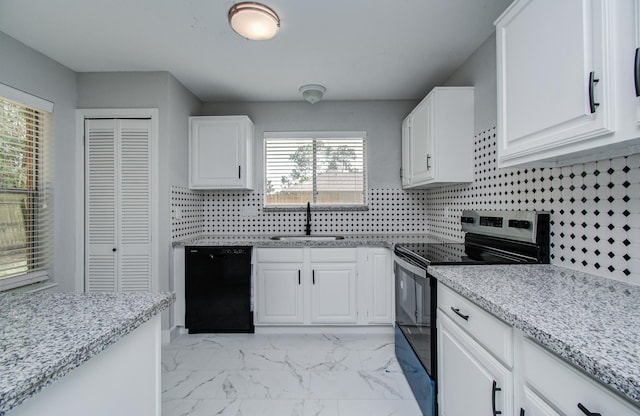 2207 S Ferrisburg Ct, Sugar Land, TX 77478 - kitchen featuring dishwasher, range with electric stovetop, light marble finish flooring, and white cabinets