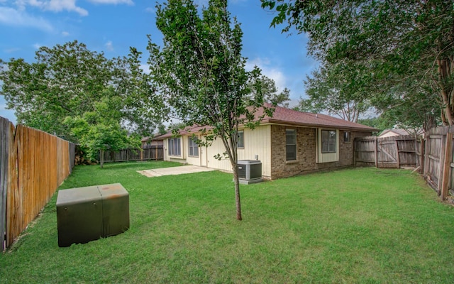 2207 S Ferrisburg Ct, Sugar Land, TX 77478 - fenced backyard with a patio