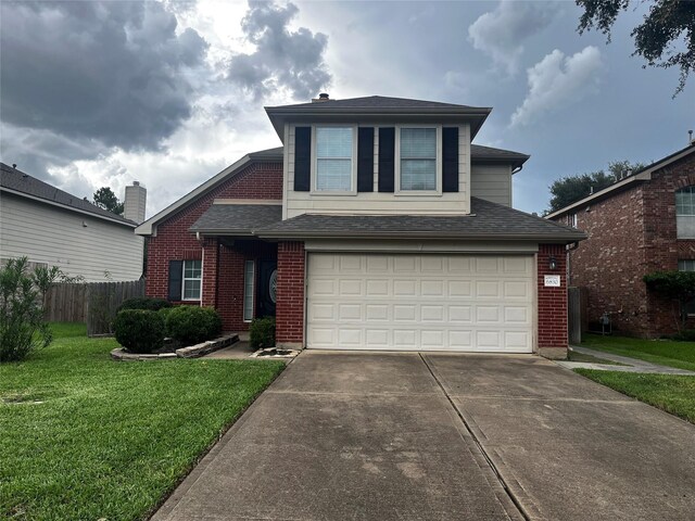 6830 Silver Shores Ln, Katy, TX 77449 - traditional home featuring driveway, an attached garage, a shingled roof, and brick siding