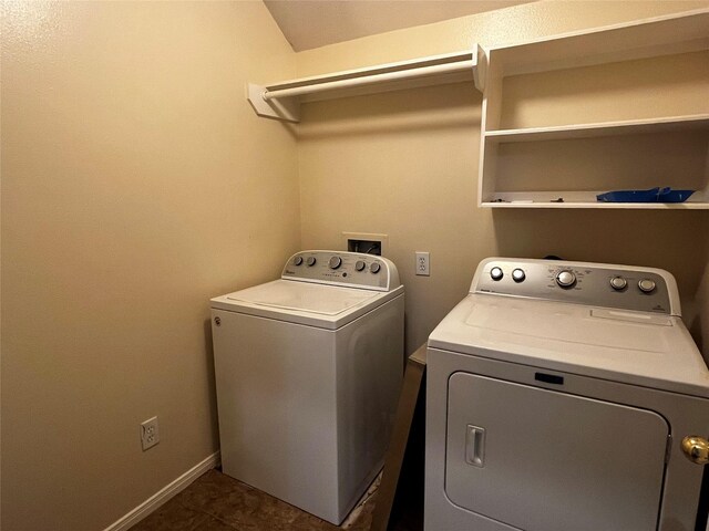 6830 Silver Shores Ln, Katy, TX 77449 - washroom featuring washing machine and dryer and baseboards