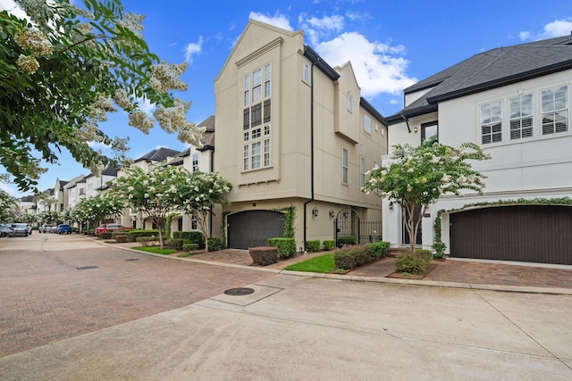 1753 Upland Lks, Houston, TX 77043 - view of property with a residential view and a garage