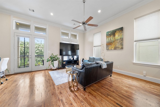 1753 Upland Lks, Houston, TX 77043 - living area with ornamental molding, a ceiling fan, wood finished floors, and recessed lighting