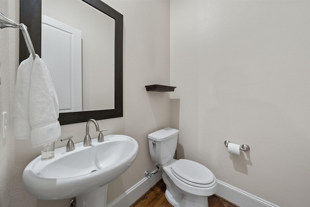 1753 Upland Lks, Houston, TX 77043 - half bath with baseboards and wood finished floors
