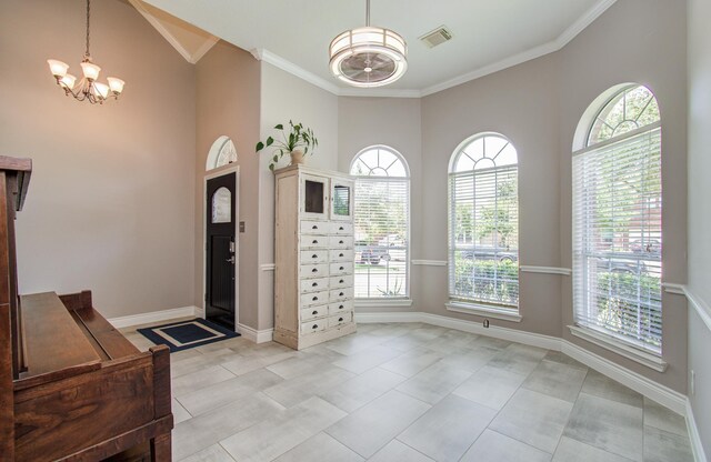 12807 Sienna Trails Dr, Tomball, TX 77377 - foyer entrance featuring a chandelier, healthy amount of natural light, and crown molding