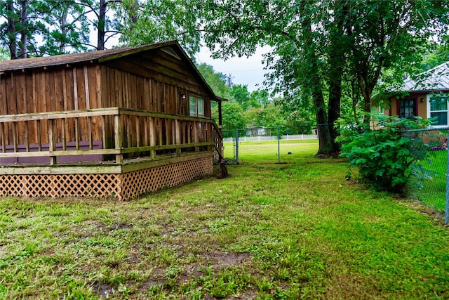 507 Elk Dr, Crosby, TX 77532 - view of yard featuring a deck