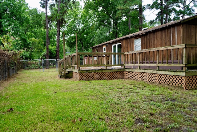 507 Elk Dr, Crosby, TX 77532 - fenced backyard with a deck