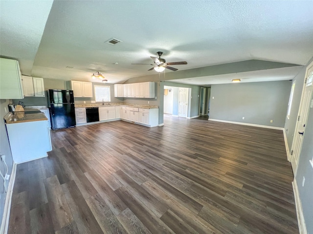 507 Elk Dr, Crosby, TX 77532 - kitchen featuring black appliances, open floor plan, lofted ceiling, dark wood-style floors, and a ceiling fan
