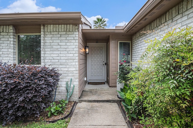 5427 Cairnleigh Dr, Houston, TX 77084 - view of exterior entry featuring brick siding