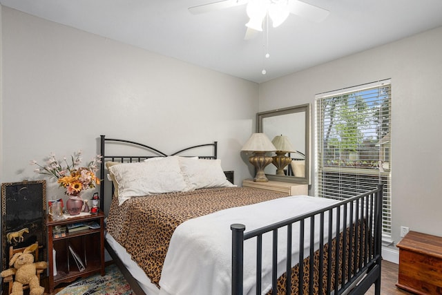 5427 Cairnleigh Dr, Houston, TX 77084 - bedroom featuring wood finished floors and a ceiling fan