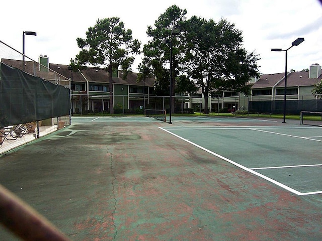 14777 Wunderlich Dr Unit 2404, Houston, TX 77069 - view of tennis court featuring a residential view