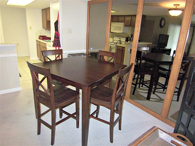 14777 Wunderlich Dr Unit 2404, Houston, TX 77069 - dining area featuring baseboards