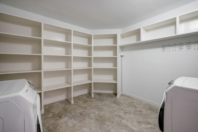 5502 Lincrest Ln, Houston, TX 77056 - washroom featuring separate washer and dryer and baseboards