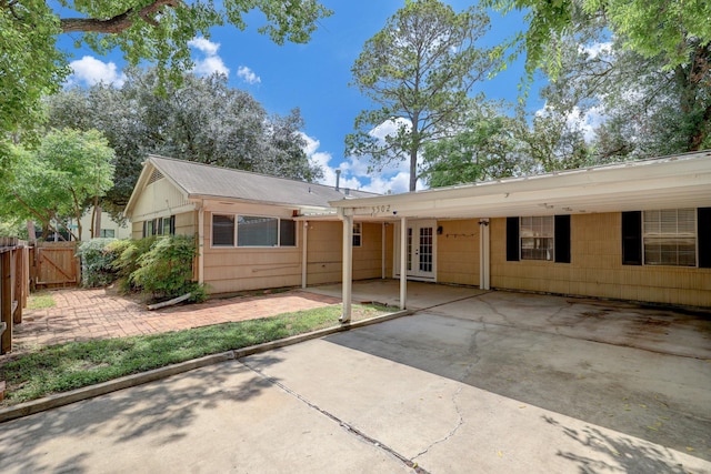 5502 Lincrest Ln, Houston, TX 77056 - view of front facade with a patio area, a gate, and french doors
