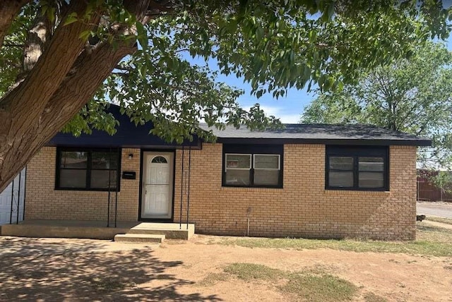 402 51st St, Lubbock, TX 79404 - view of front facade with brick siding
