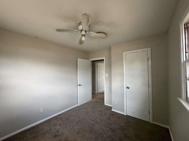 402 51st St, Lubbock, TX 79404 - unfurnished bedroom featuring carpet flooring and a ceiling fan