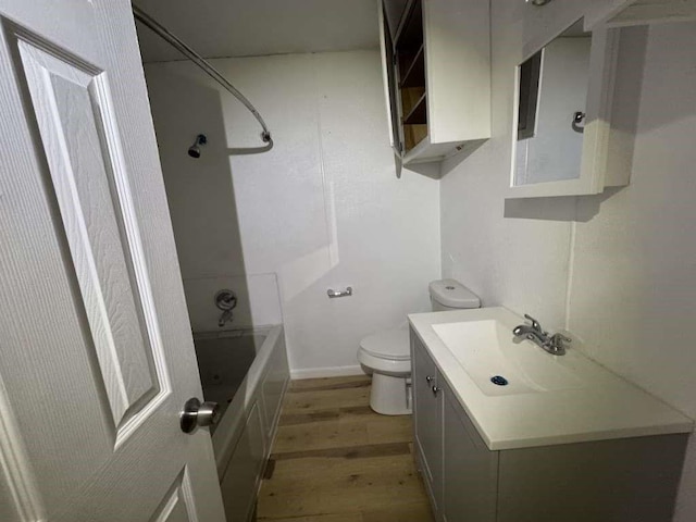 402 51st St, Lubbock, TX 79404 - full bath with wood finished floors,  shower combination, and vanity