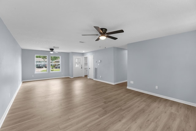 14234 Cellini Dr, Cypress, TX 77429 - unfurnished living room featuring a ceiling fan and wood finished floors